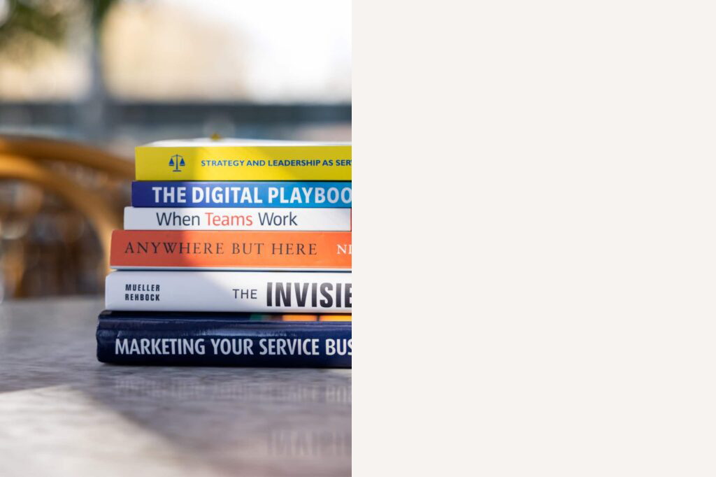Stack of acclaimed non-fiction books promoted by The Book Publicist